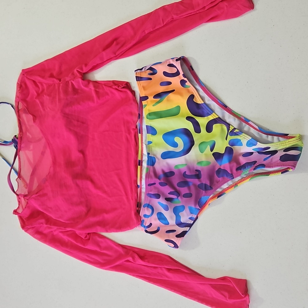 Bikini rainbow colors with cover up top. Size Medium